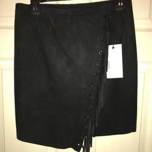 Black ultra suede skirt with fringe on front flap
